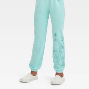 Star Wars Jogger Pants fashioned in a turquoise blue print of C-3PO/r2d2